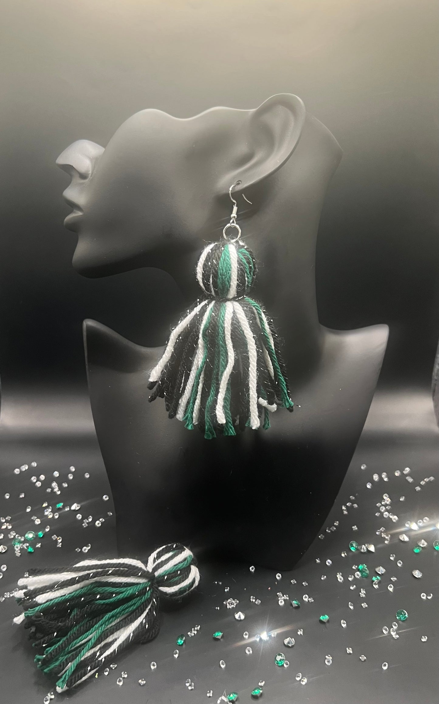 #26 Tassel Me, Honnee Green, white and black with silver stripe and pom