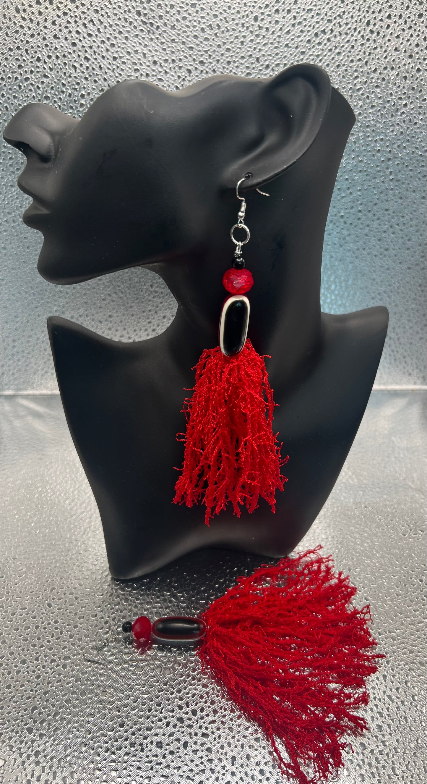 #581-1 Red & black oval shape topper with red fringe tassels