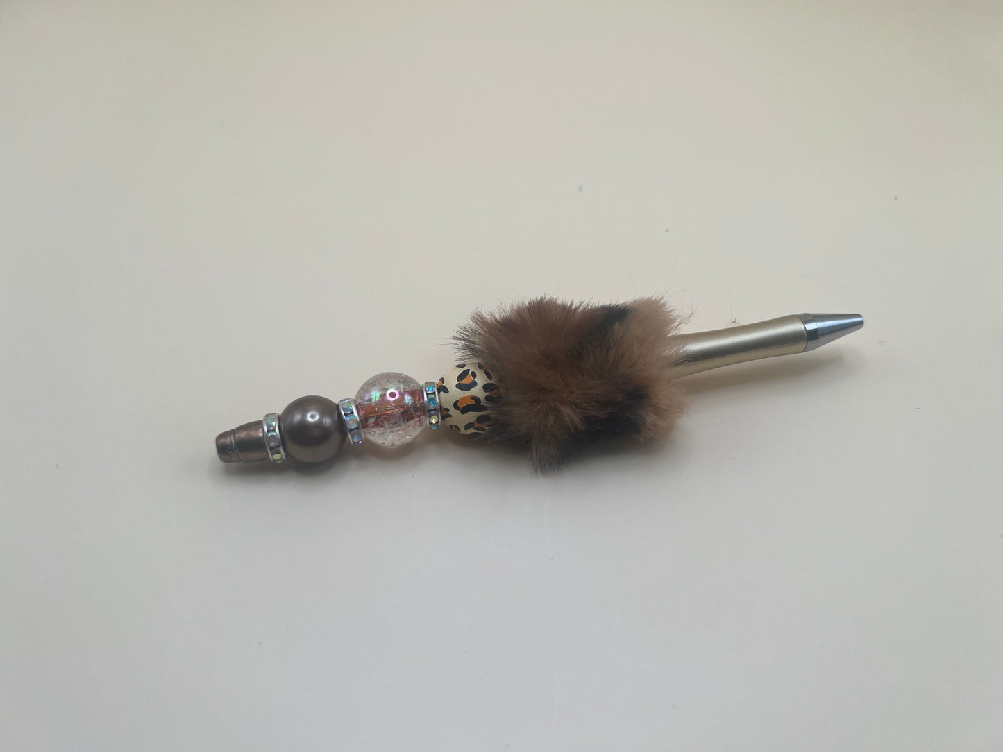 2441-2 brown and black pom with brown ball