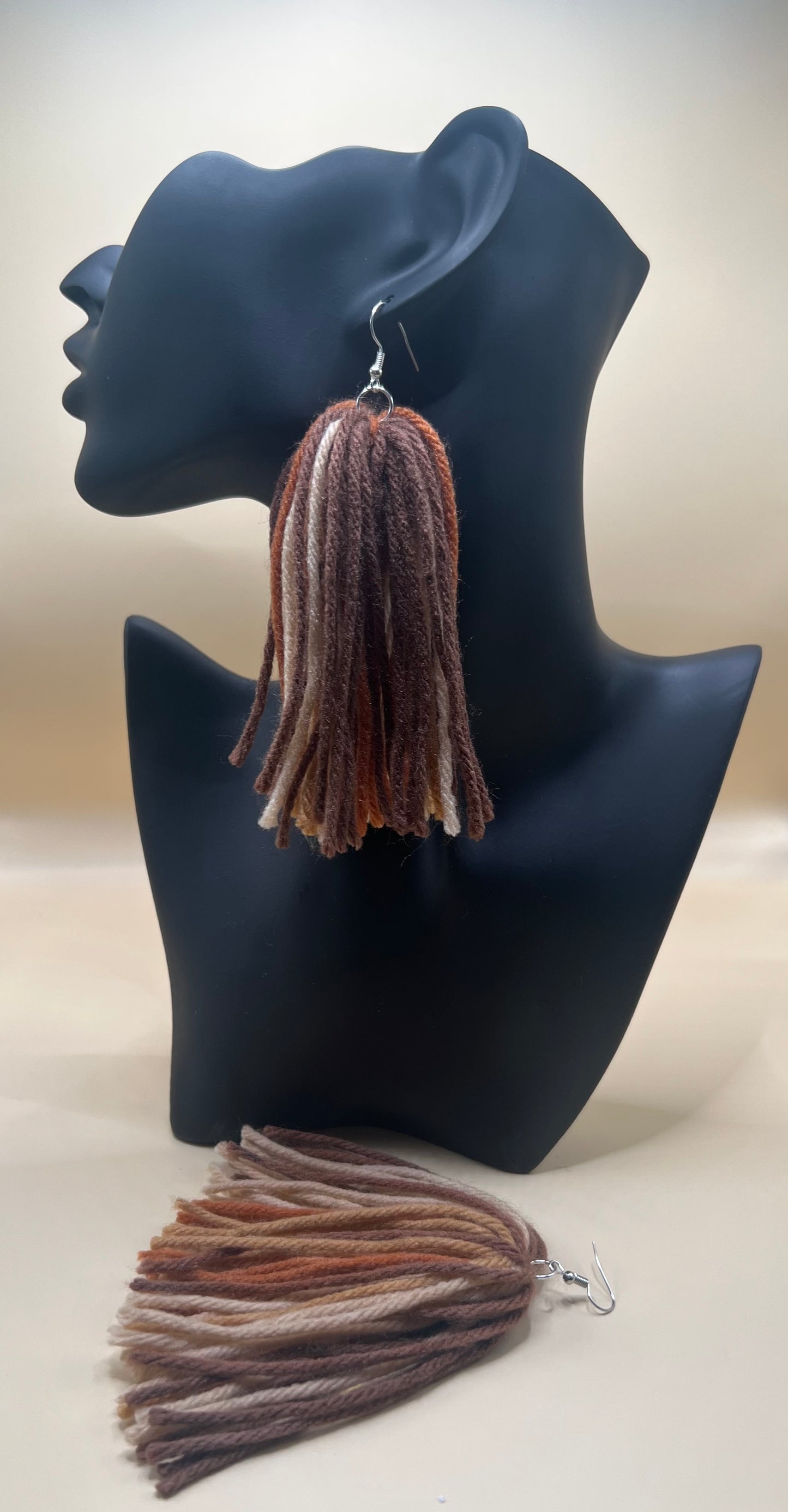#25 Tassel Me, Honnee Blended tan, beige and brown flowing tassel