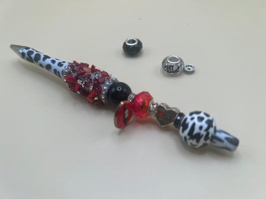 2453-2 cow print with red lip charm